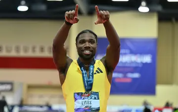 Noah Lyles reacts after winning the Men's 60m Dash Final by .01 seconds over Christian Coleman