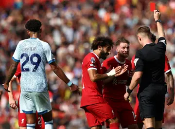 Alexis Mac Allister (2nd right) was sent off on his Liverpool home debut