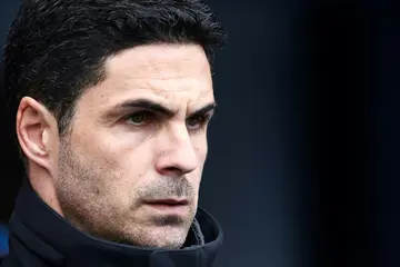 Mikel Arteta's Arsenal are involved in a three-way Premier League title race