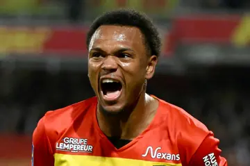 Lens' Belgian forward Lois Openda celebrates scoring his team's second goal during the French L1 football match between RC Lens and AS Monaco at Stade Bollaert-Delelis in Lens, northern France on April 22, 2023.