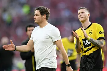 Dortmund coach Edin Terzic (L) and veteran Marco Reus, who will return to Wembley after 11 years for Saturday's Champions League final