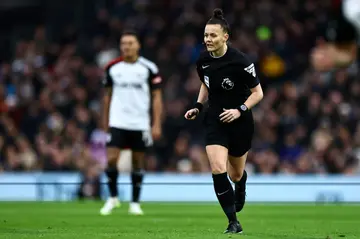 Landmark achievement: Rebecca Welch takes charge of the match between Fulham and Burnley as she becomes the first female referee of an English Premier League football fixture