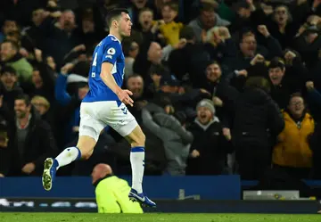 Michael Keane celebrates his late equaliser