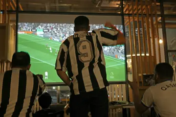Newcastle fans now watch matches on big-screen televisions in the Saudi Arabia's cafes.