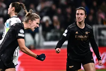 Vivianne Miedema (L) celebrates the equalising goal for Arsenal against Juventus