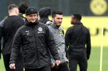 Edin Terzic (L) and Nuri Sahin take a Dortmund training session on the eve of their UEFA Champions League quarter-final second leg against Atletico Madrid in April