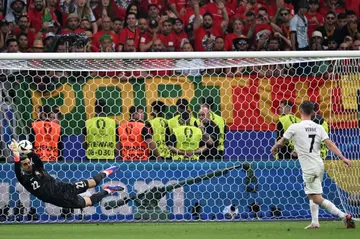 Portugal goalkeeper Diogo Costa made three penalty saves to send his team through to the Euros last eight