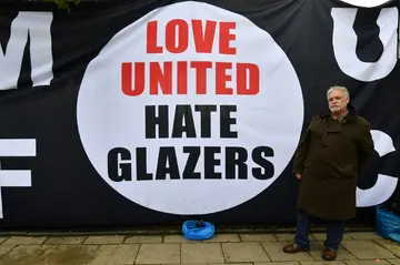 Manchester United fans marched on Old Trafford in a protest aimed at the club's owners, the Glazer family, on Monday