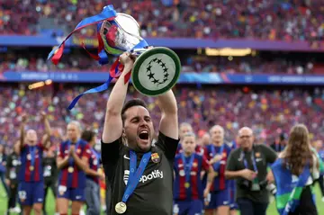 Barcelona's Spanish coach Jonatan Giraldez celebrates after winning women's Champions League final against Lyon