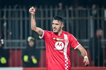 On target: Monza forward Dany Mota celebrates after scoring his team's second goal against AC Milan