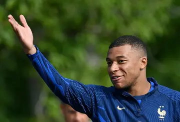 Paris Saint-Germain's France forward Kylian Mbappe attends a training session ahead of the upcoming UEFA Euro 2024 qualifying matches
