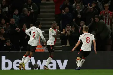 Southampton's Moussa Djenepo (C) celebrates scoring against Manchester City