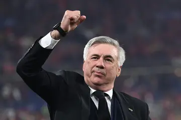 Real Madrid's Italian coach Carlo Ancelotti gestures as he celebrates his team's victory during the UEFA Champions League final in May 2022