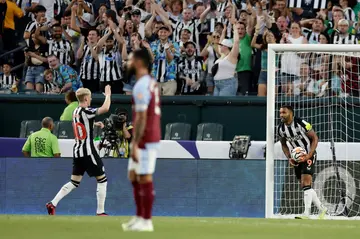 Callum Wilson celebrates after scoring the equaliser in Newcastle's 3-3 friendly draw with Aston Villa in Philadelphia