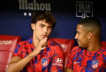 Atletico Madrid's Portuguese forward Joao Felix (L) has agreed to join Barcelona on loan for the season