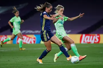 Sara Bjork Gunnarsdottir (L) in action for Lyon in the 2020 Women's Champions League final against VfL Wolfsburg