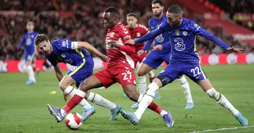 Middlesbrough's Marc Bola and Chelsea's Hakim Ziyech (right) battle for the ball during the Emirates FA Cup quarter final match at the Riverside Stadium. Photo by Richard Sellers.