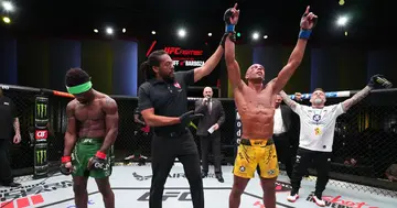 Edson Barboza celebrates victory over Sodiq Yusuff.