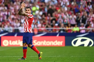Atletico Madrid's Argentinian forward Angel Correa claps as he leaves the pitch against Girona