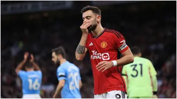 Bruno Fernandes looks dejected during the Premier League match between Manchester United and Manchester City at Old Trafford. Photo by Simon Stacpoole.