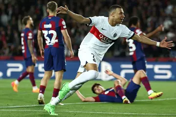 Paris Saint-Germain's French forward Kylian Mbappe netted twice against Barcelona at Montjuic in the Champions League