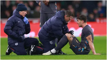 John Stones is treated before being forced off with an injury during the international friendly match between England and Belgium. Photo by Marc Atkins.