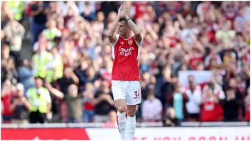 Granit Xhaka applauds fans after being substituted off during the Premier League match between Arsenal FC and Wolverhampton Wanderers at Emirates Stadium. Photo by Catherine Ivill.