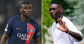 Paris Saint-Germain player Randal Kolo Muani waving at fans.