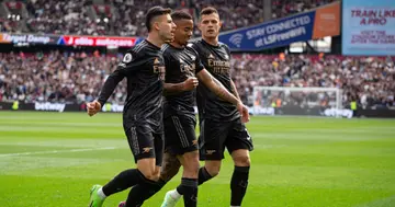 Arsenal stars celebrate after scoring during the Premier League match between West Ham United and Arsenal at the London Stadium. Photo by Federico Guerra Maranesi.