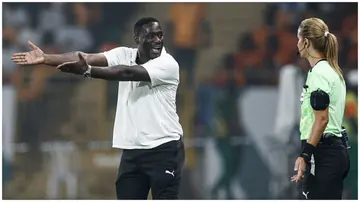 Emerse Fae speaks with Moroccan referee Bouchra Karboubi during the Africa Cup of Nations 2023 Round of 16 match between Senegal and Ivory Coast. Photo: KENZO TRIBOUILLARD.