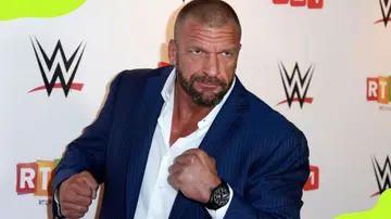 Triple H poses before a WrestleMania Revenge Tou in 2016