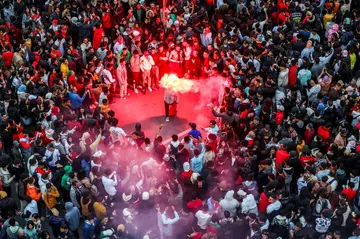 Fans in Rabat, the Moroccan capital, celebrate victory over Portugal