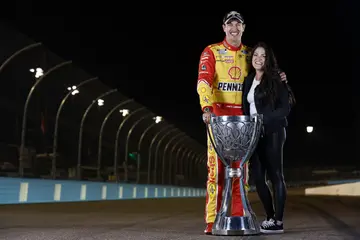 How old is joey Logano's wife?