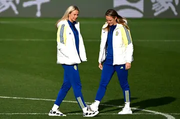 Sweden's central defensive parters Magdalena Eriksson (R) and Amanda Ilestedt on the pitch at Eden Park in Auckland on Thursday