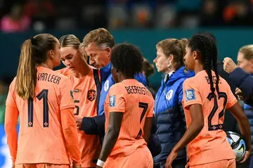 Netherlands coach Andries Jonker speaks to his players on the touchline