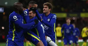 Hakim Ziyech celebrates with teammates after scoring their second goal during the English Premier League football match between Watford and Chelsea at Vicarage Road Stadium (Photo by Adrian DENNIS)