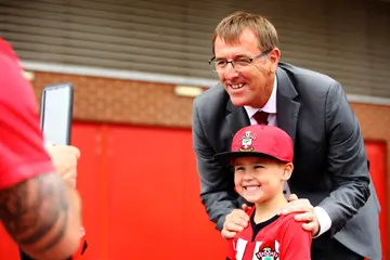 Matt Le Tissier poses for with a fan ahead of the Pre-Season friendlies