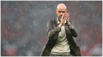 Erik ten Hag applauds the Manchester United fans at full time during the Premier League match against Arsenal FC at Old Trafford on May 12, 2024