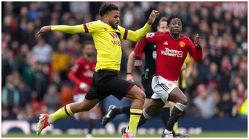 Burnley forward, Lyle Foster, dribbles past Man Unted's Kobbie Mainoo in the Premier League at Old Trafford on April 27, 2024, England. Photo: Visionhaus. 