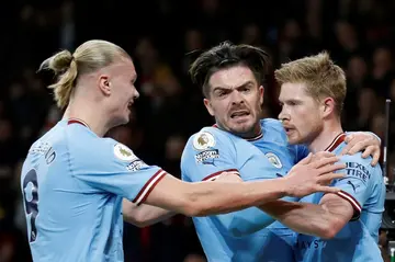 Manchester City elebrate a crucial victory at Arsenal