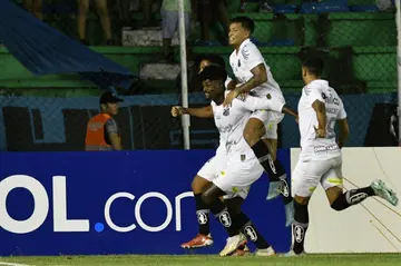 Santos defender Eduardo Bauermann, seen here celebrating a goal in a match in April, has been dropped by the Brazilian club after being implicated in a match-fixing scandal