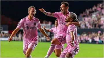 Lionel Messi celebrates with teammates DeAndre Yedlin and Christopher McVe after scoring during a Leagues Cup group match against Cruz Azul at DRV PNK Stadium. David Santiago.