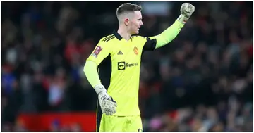Dean Henderson celebrates their opening goal during the Emirates FA Cup Fourth Round match between Manchester United and Middlesbrough at Old Trafford. Photo by Alex Livesey.