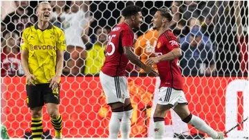 Antony celebrates his goal with Jadon Sancho during the pre-season friendly match between Manchester United and Borussia Dortmund. Photo by Marco Steinbrenner.