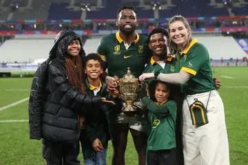 Siya Kolisi with his family members