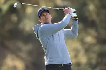 Tom Brady plays a shot during the first round of the AT&T Pebble Beach