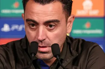 Barcelona coach Xavi Hernandez speaking to reporters at the Parc des Princes on Tuesday