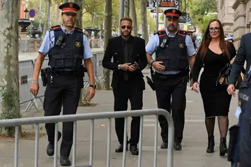 Neymar arrives at court during his recent trial in Barcelona