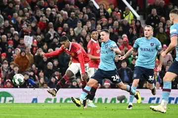 Solo effort - Marcus Rashford (L) scores Manchester United's second goal in their 2-0 League Cup win over Burnley at Old Trafford
