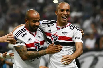 Former Brazil defender Miranda (right) celebrates during a Copa Sudamericana match between his team Sao Paulo and Ceara in August 2022
